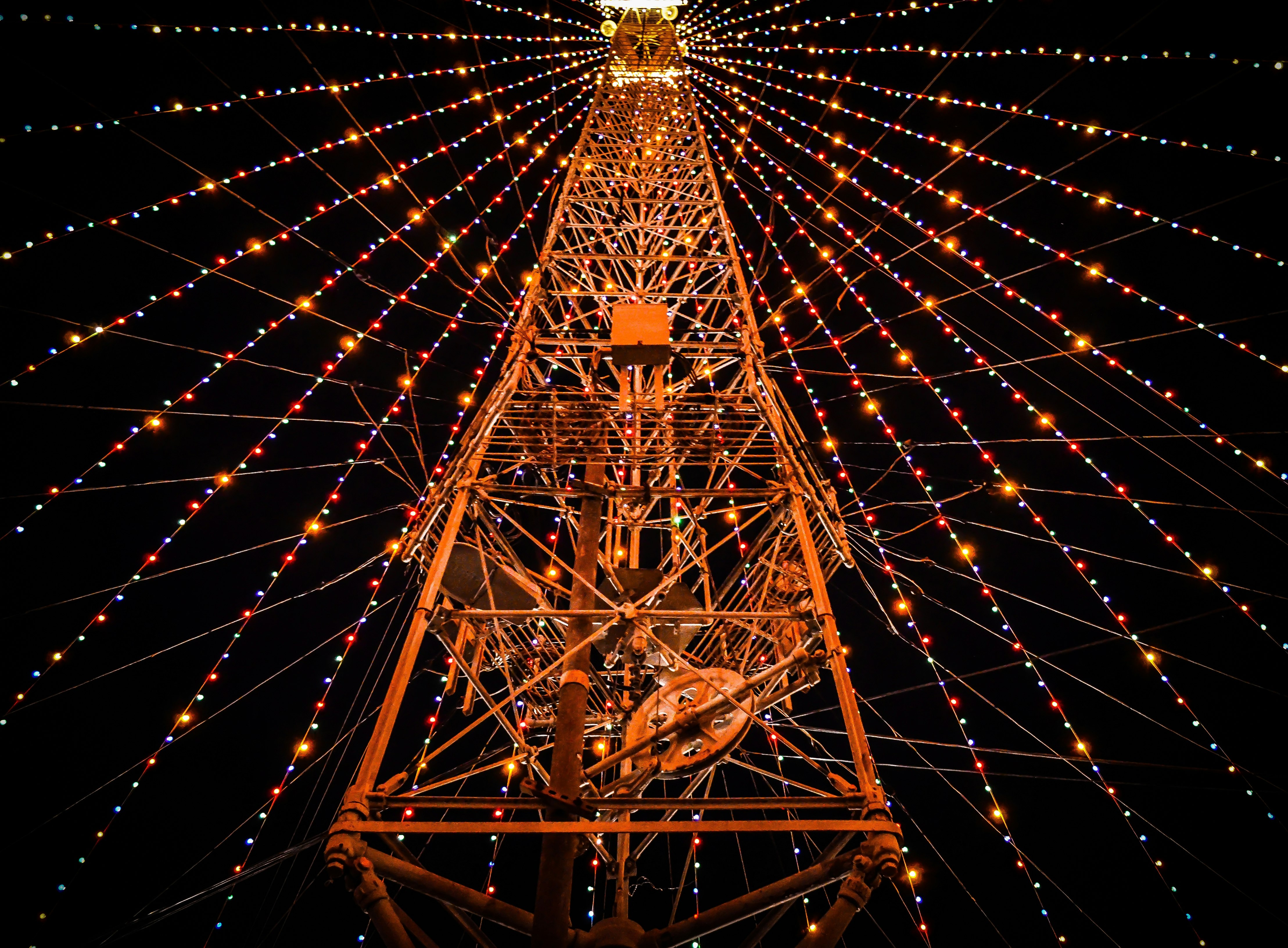 photo of tower with string lights